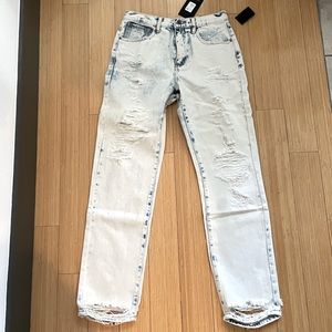 Ripped light wash straight leg jeans